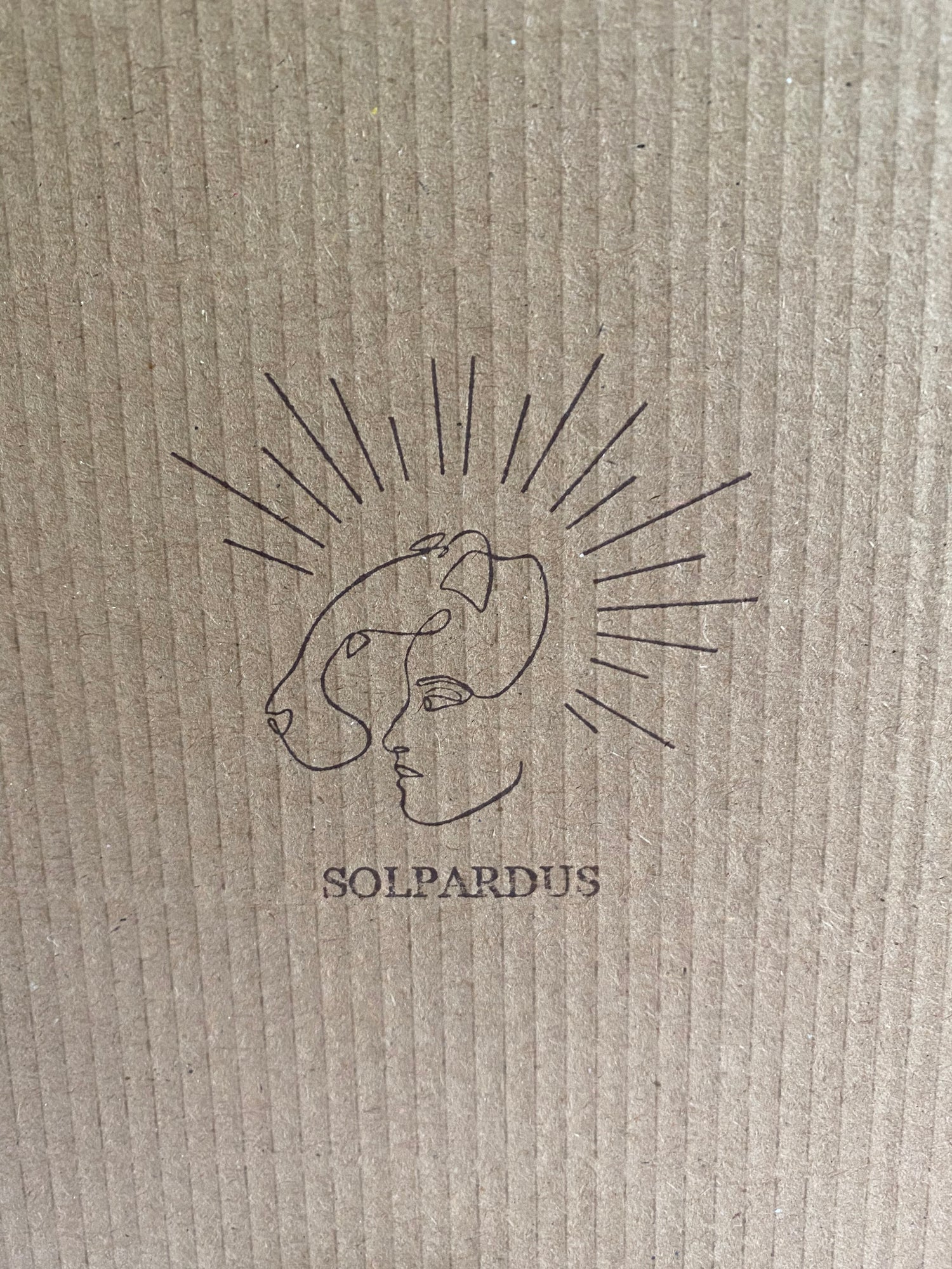 Solpardus logo stamped on eco friendly recyclable cardboard packaging