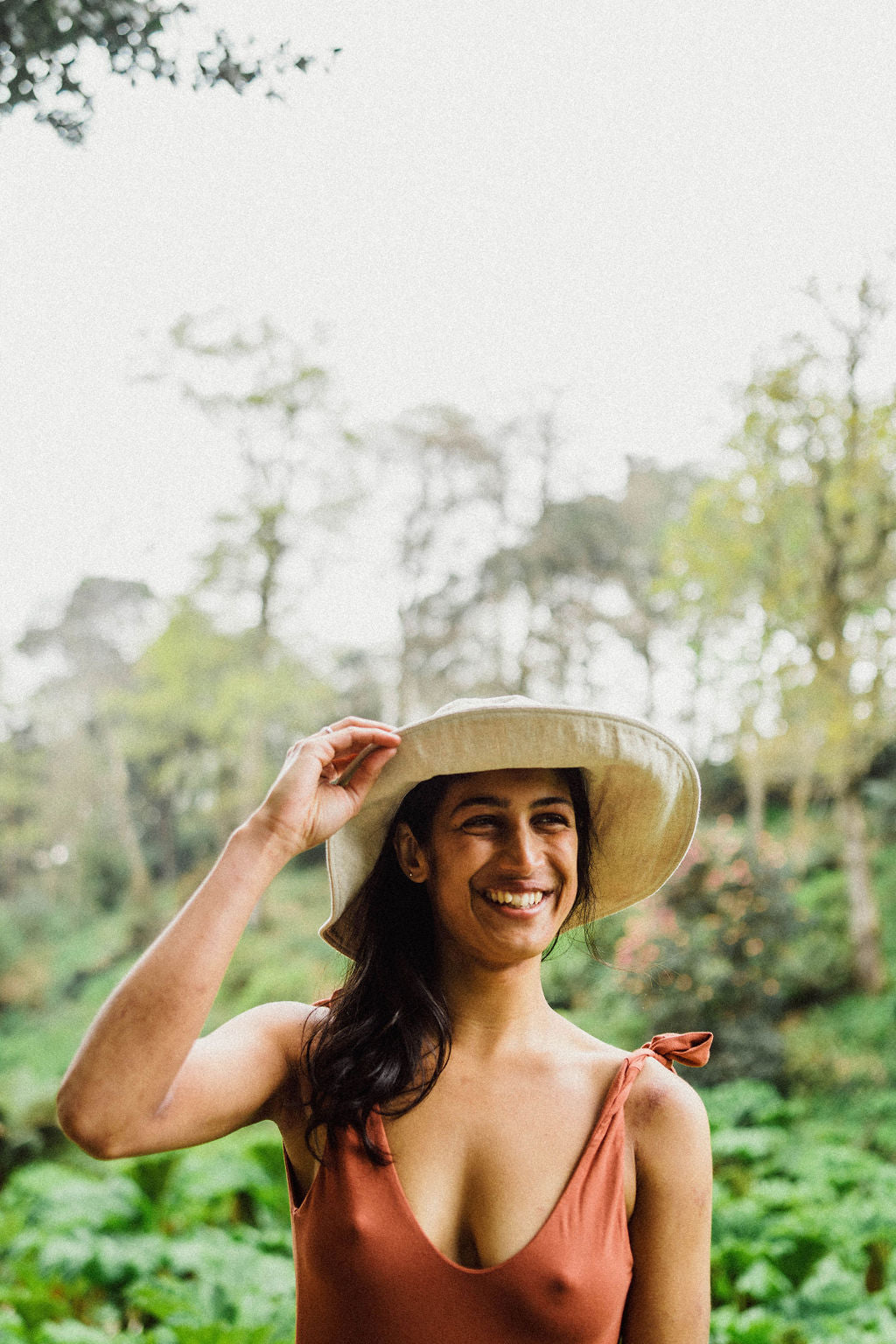 Solpardus happiness in Trebah sun. Nyx linen hat Thea bamboo onepiece. All natural ethical sustainable sunwear swimwear linen clothing perfect for sensitive skin psoriasis and eczema