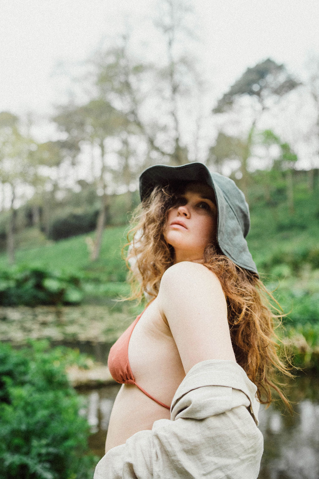 Solpardus collection in Cornish nature at Trebah gardens in Cornwall. Nyx linen hat Thea bamboo bikini top Saba linen shirt. All natural ethical sustainable sunwear swimwear linen clothing perfect for sensitive skin psoriasis and eczema